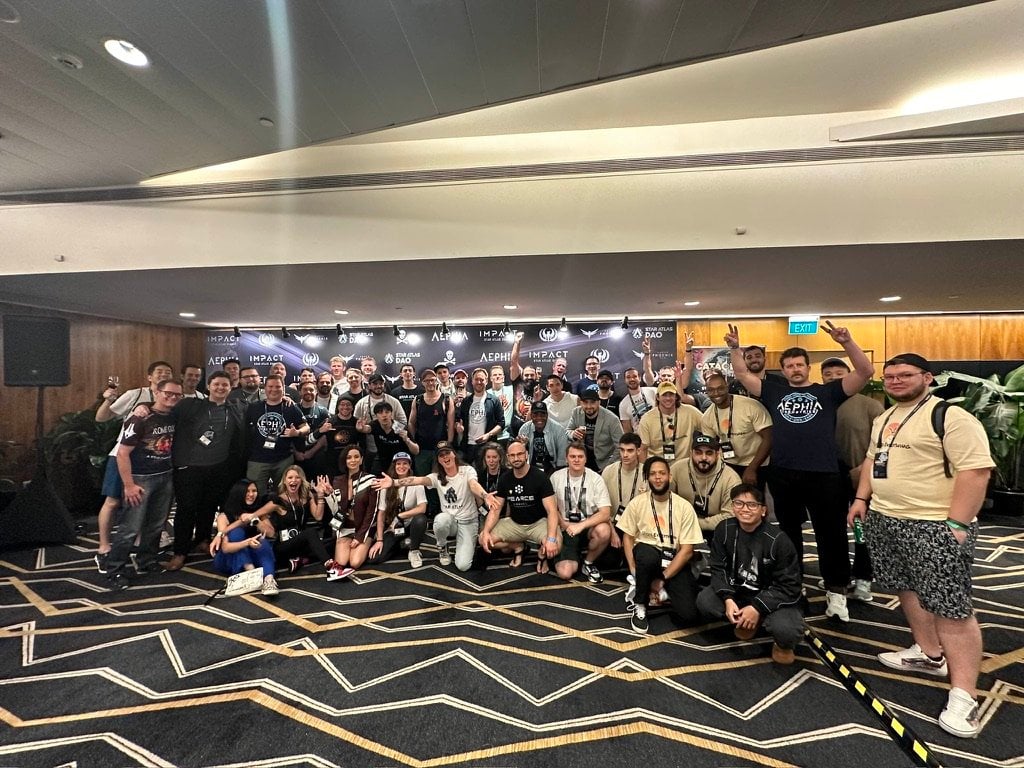 Star Atlas – IMPACT – Group picture at the end of the day with the team & remaining community members.